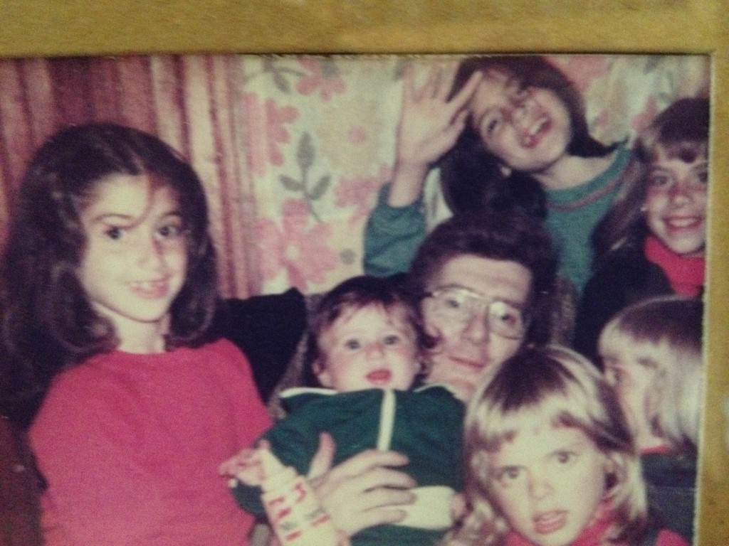Me and my sisters and cousins...I'm the littlest one (in the green jump suit) and Lisa's the blonde one in the top right.